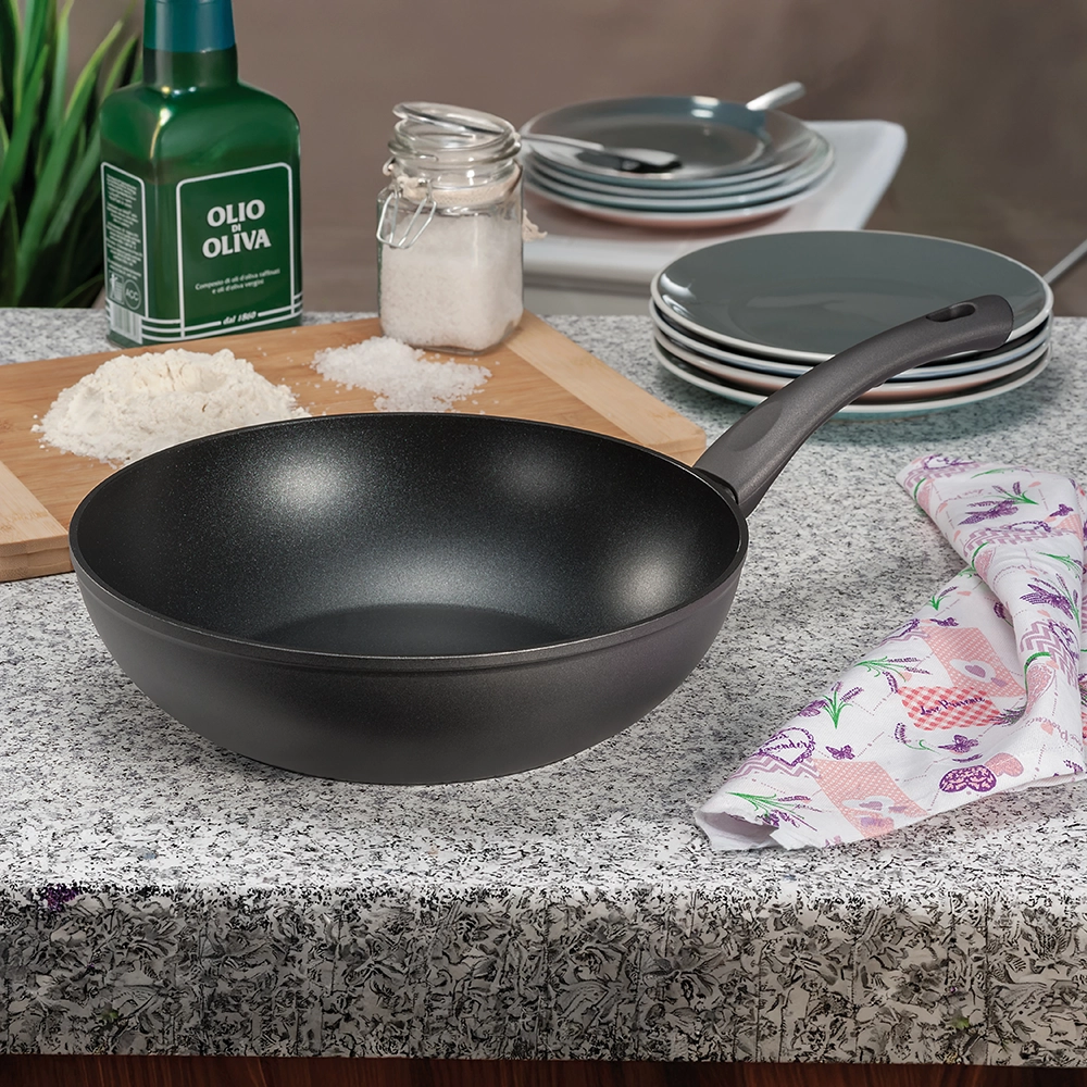 Non-stick frying pan retouching with realistic metal surface enhancement
