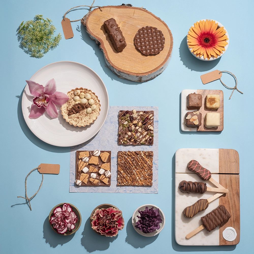 Food photo retouching of assorted chocolates and cookies.