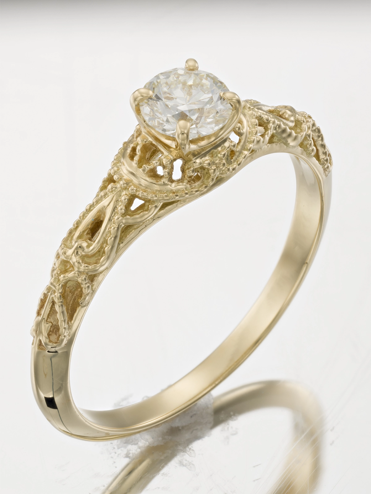 Clean jewelry retouching for gold earrings with realistic shadow and reflection