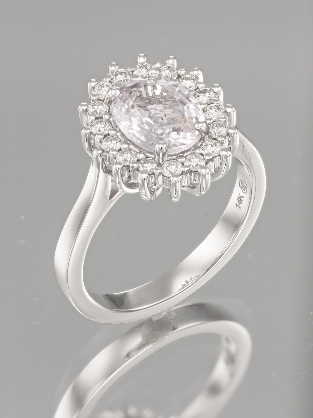 Commercial jewelry retouching for pink sapphire ring with dust and scratch removal