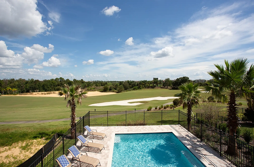 HDR real estate photo editing services for luxury pool view.